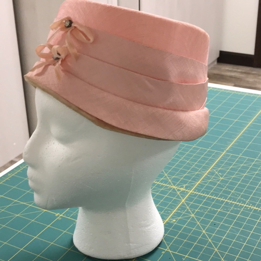 Aww. A neat pillbox? Vintage pink hat